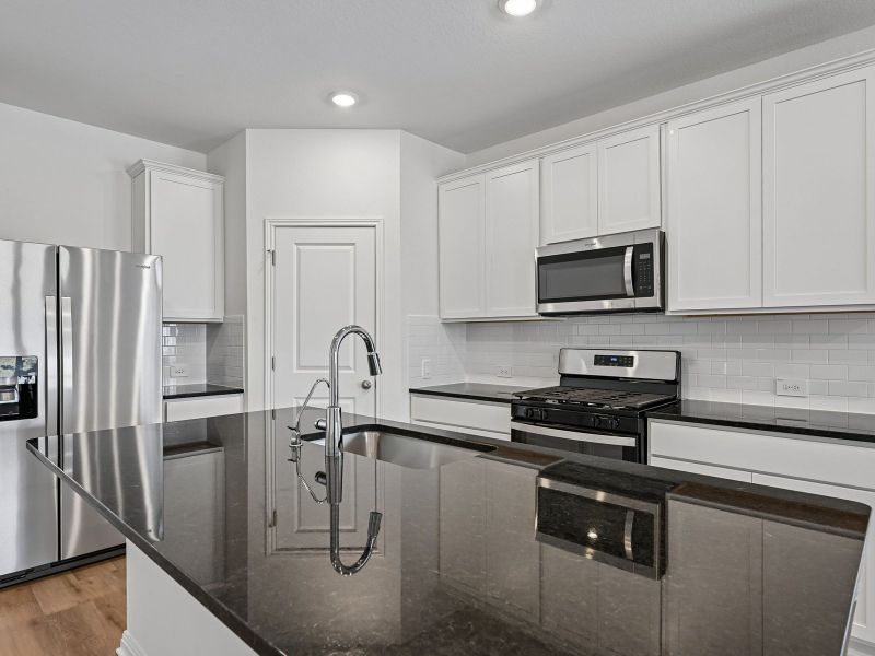 Furnished interior view inside a new home in Travena - Reserve Collection, Georgetown (Image 3).
