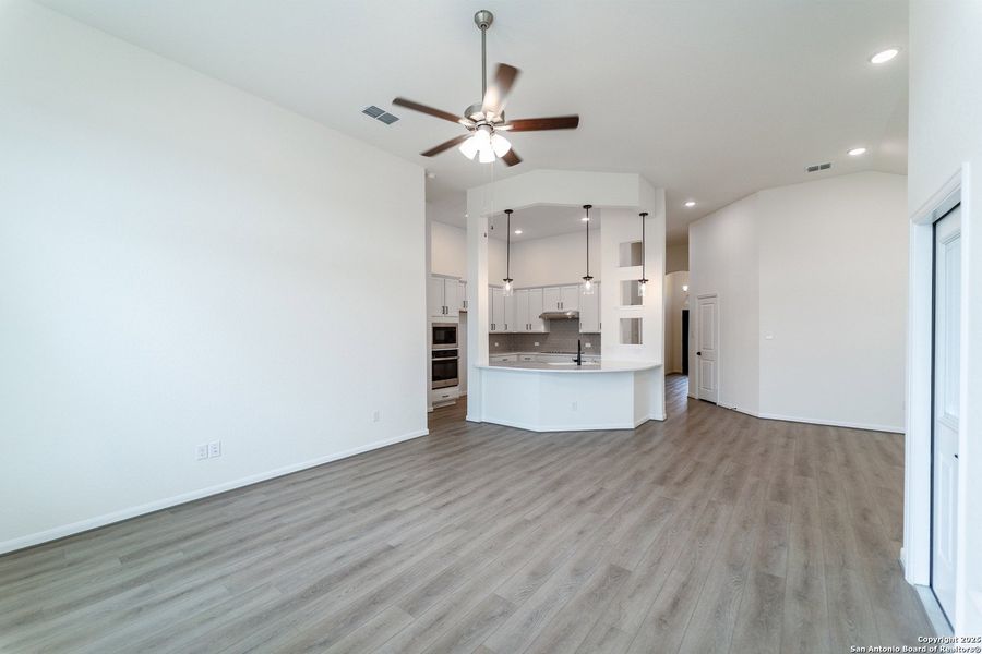 Spacious, unfurnished interior of a new home in The Woodlands at Medina Hills, Mico (Image 9).