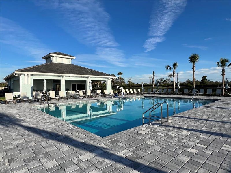 Front exterior of a new home in , Port Charlotte, FL, highlighting curb appeal (Image 18).