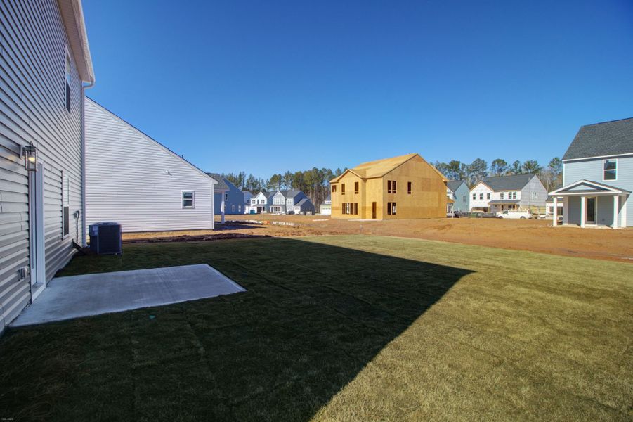 Exterior details and patio area of a home in Homecoming, Ravenel (Image 25).