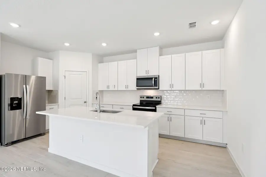 Furnished interior view inside a new home in Flagler Village - Signature Series, Palm Coast (Image 6).