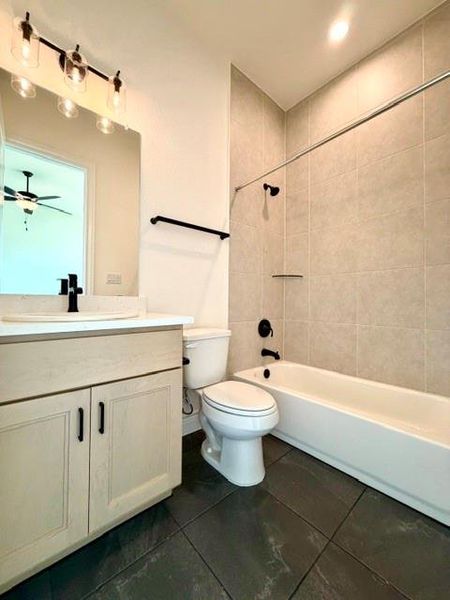 Clean lines and a modern vanity define this pristine bathroom space. Clean lines and a modern vanity define this pristine bathroom space.