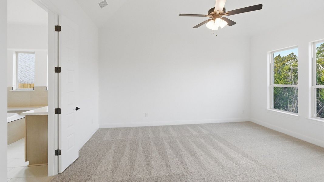 Furnished interior view inside a new home in Oaks at San Gabriel, Georgetown (Image 10).