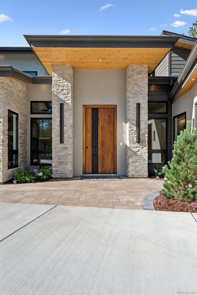 Front exterior of a new home in , Monument, CO, highlighting curb appeal (Image 19).