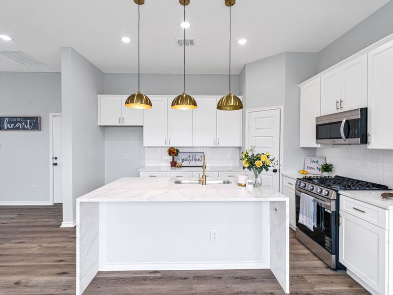 Everyone gather around and prepare to eat at this great breakfast bar off the island