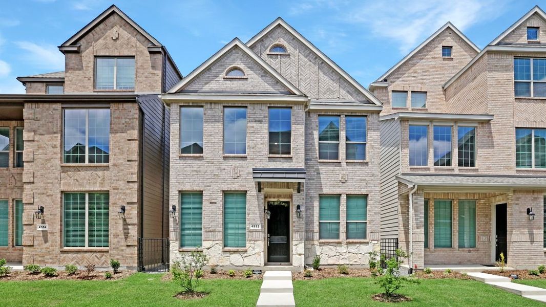 Front exterior of a new home in The Avenue, Allen, TX, highlighting curb appeal (Image 2).
