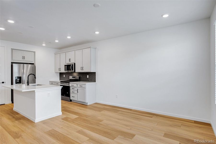Furnished interior view inside a new home in Westside Crossing Townhomes, Berthoud (Image 13).