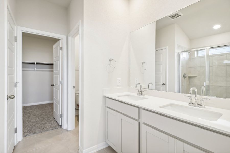 Primary suite bathroom in the Briscoe floorplan at a Meritage Homes community.