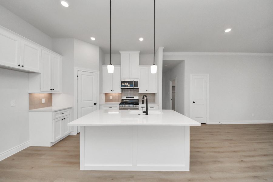 Furnished interior view inside a new home in Lexington Heights, Willis (Image 5). Furnished interior view inside a new home in Lexington Heights, Willis (Image 5).