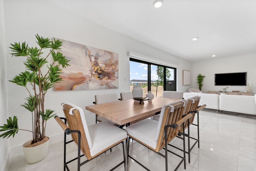 Representative furnished interior of a home built from the Model E by Onx Homes in On Alba, Florida City (Image 38).