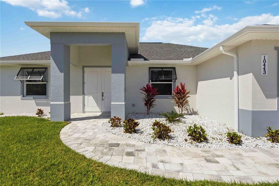 Exterior details and patio area of a home in , Port Charlotte (Image 28).