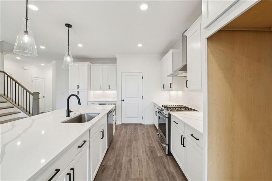Furnished interior view inside a new home in Millcroft Townhomes, Buford (Image 15). Furnished interior view inside a new home in Millcroft Townhomes, Buford (Image 15).