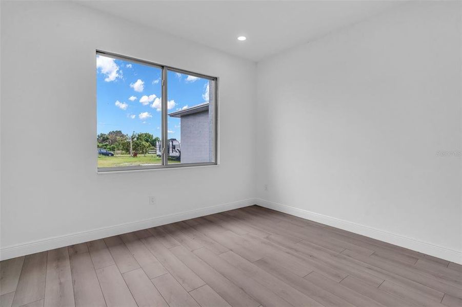 Spacious, unfurnished interior of a new home in , Okeechobee (Image 44).