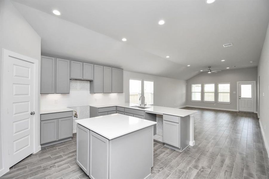 This generously spacious kitchen is a dream realized! Sample photo of completed home. Actual color and selections may vary.