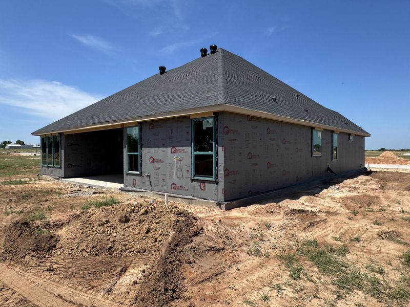 Front exterior of a new home in Stagecoach Crossing, Bridgeport, TX, highlighting curb appeal (Image 2). Front exterior of a new home in Stagecoach Crossing, Bridgeport, TX, highlighting curb appeal (Image 2).