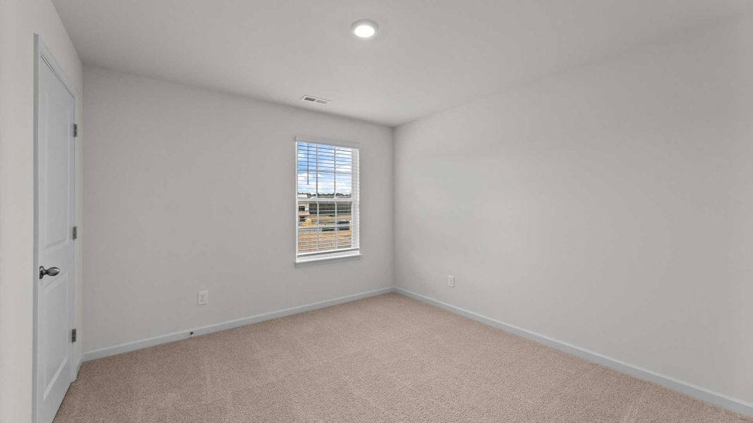 Spacious, unfurnished interior of a new home in Beaver Dam Crossing, Bailey (Image 20).