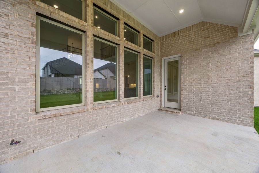 Exterior details and patio area of a home in Painted Tree Lakeside, McKinney (Image 3). Exterior details and patio area of a home in Painted Tree Lakeside, McKinney (Image 3).