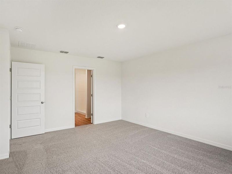 Spacious, unfurnished interior of a new home in Coasterra - Premier Series, Palmetto (Image 31).