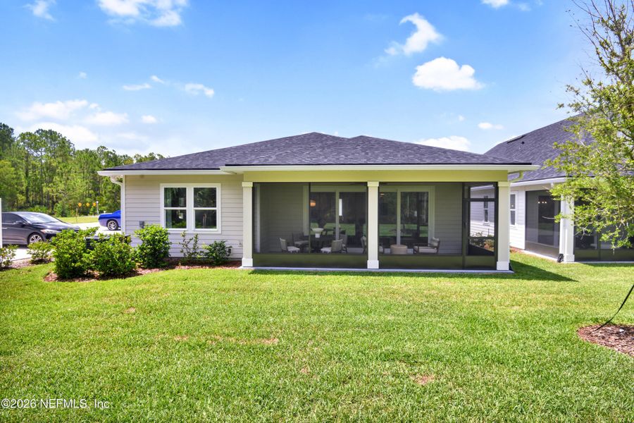Exterior details and patio area of a home in Brookestone, St. Augustine (Image 2).