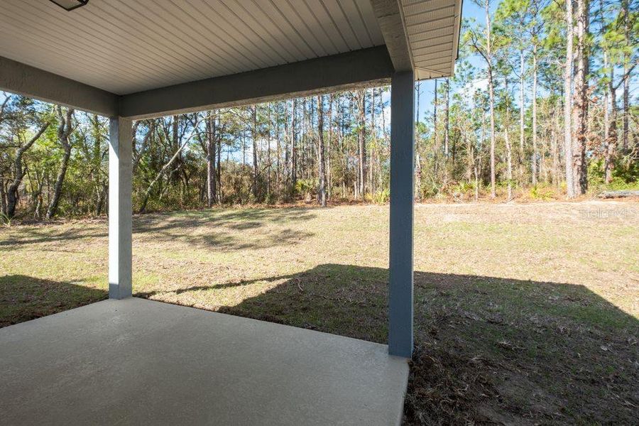 Exterior details and patio area of a home in , Citrus Springs (Image 3).