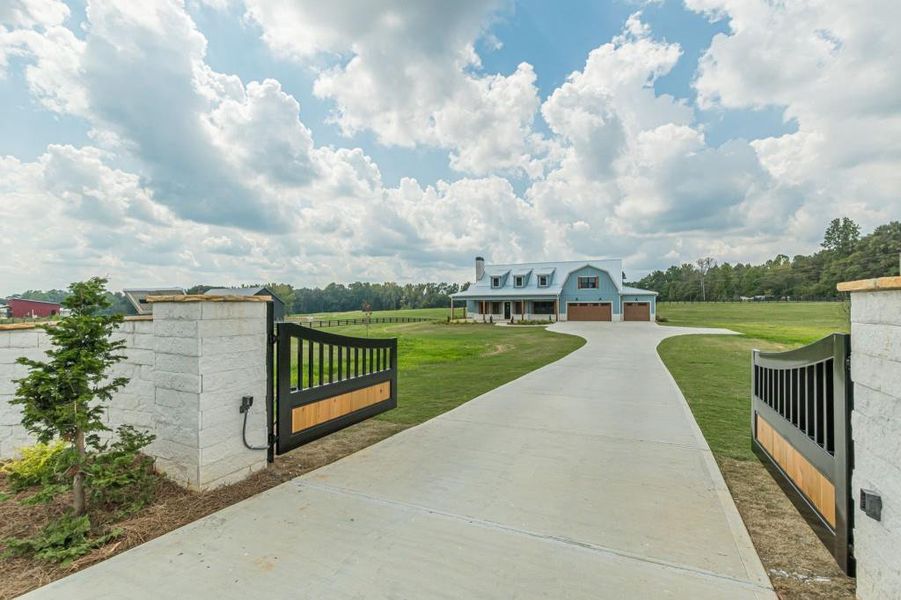 Front exterior of a new home in , Bremen, GA, highlighting curb appeal (Image 2).