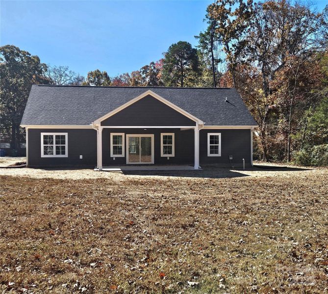 Exterior details and patio area of a home in , Midland (Image 4).