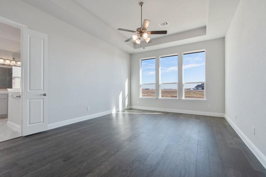 Primary Bedroom | Concept 2406 at The Meadows in Gunter, TX by Landsea Homes