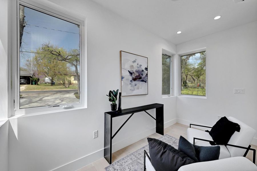 Home office featuring wood finished floors and  recessed lighting