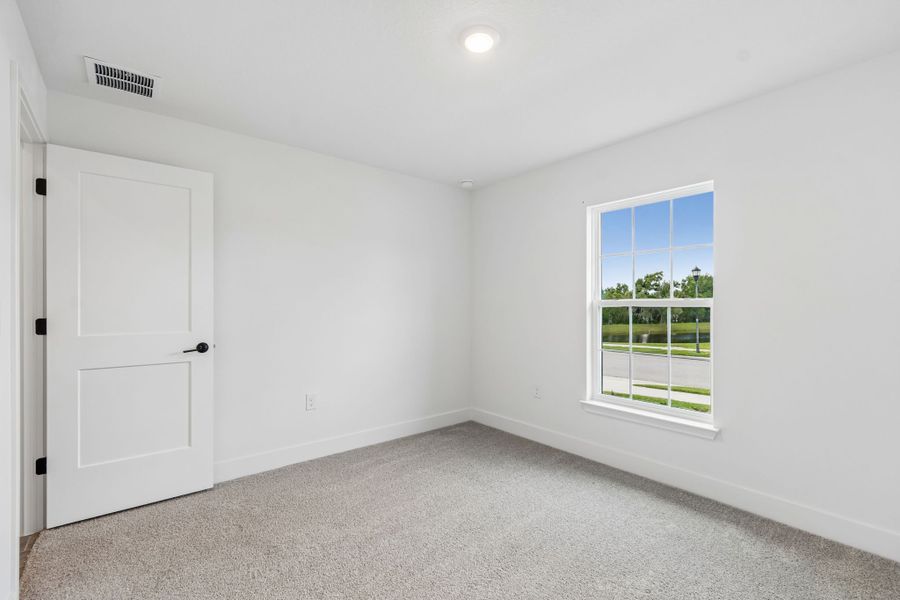Spacious, unfurnished interior of a new home in Abbey Glen, Dade City (Image 35).