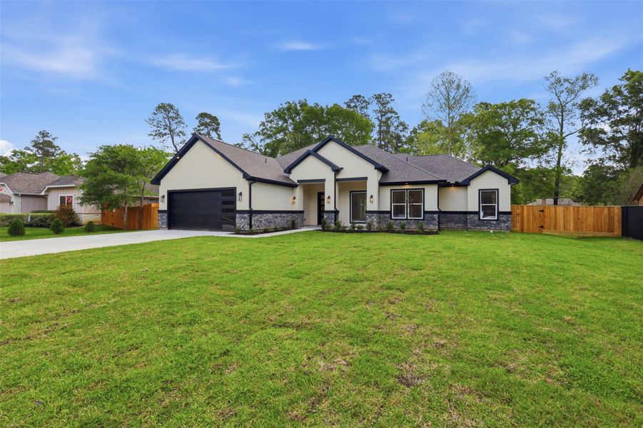 100% stone and stucco exterior, adorned with multiple coach lights and soffit lighting!