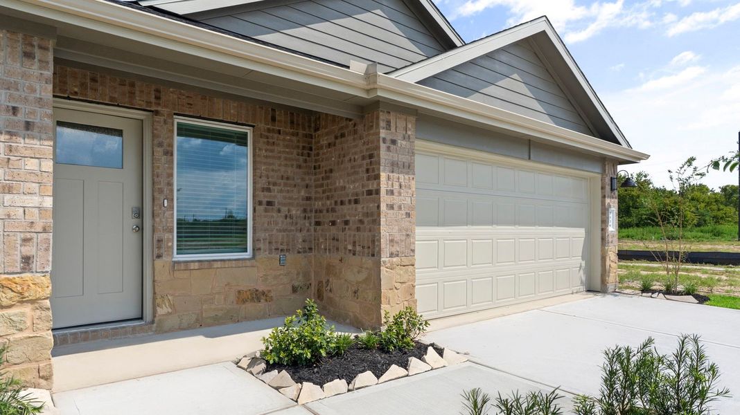 Representative exterior photo of a completed home built from the DIANA by D.R. Horton in Canterra Creek 45' and 50' Homesites, Iowa Colony, TX (Image 2).