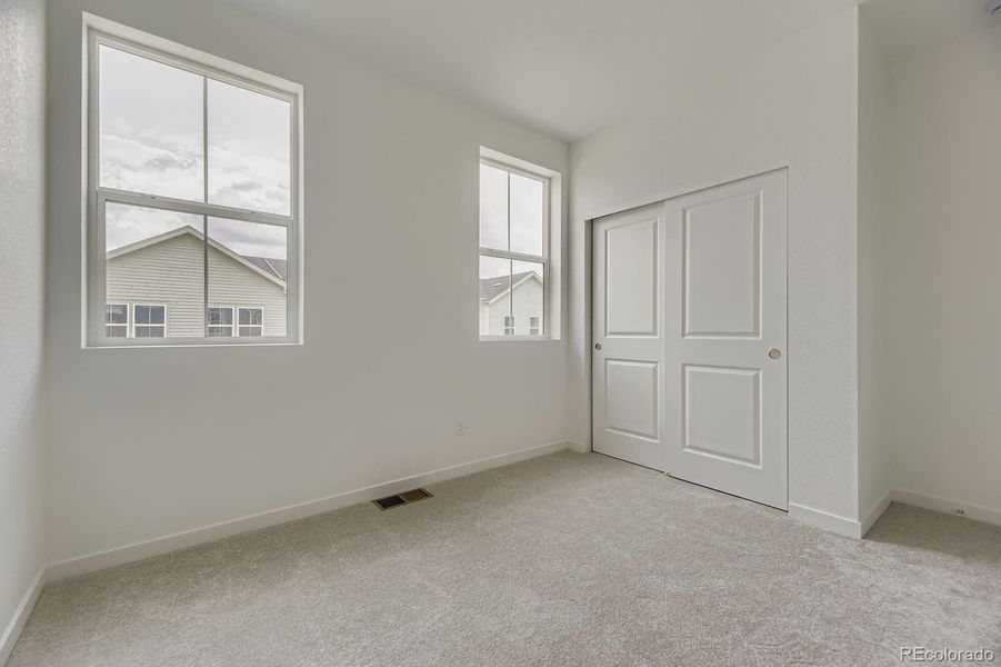 Spacious, unfurnished interior of a new home in Sky Ranch: Parkside Collection, Watkins (Image 9).