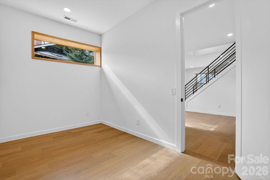 Spacious, unfurnished interior of a new home in , Asheville (Image 37).
