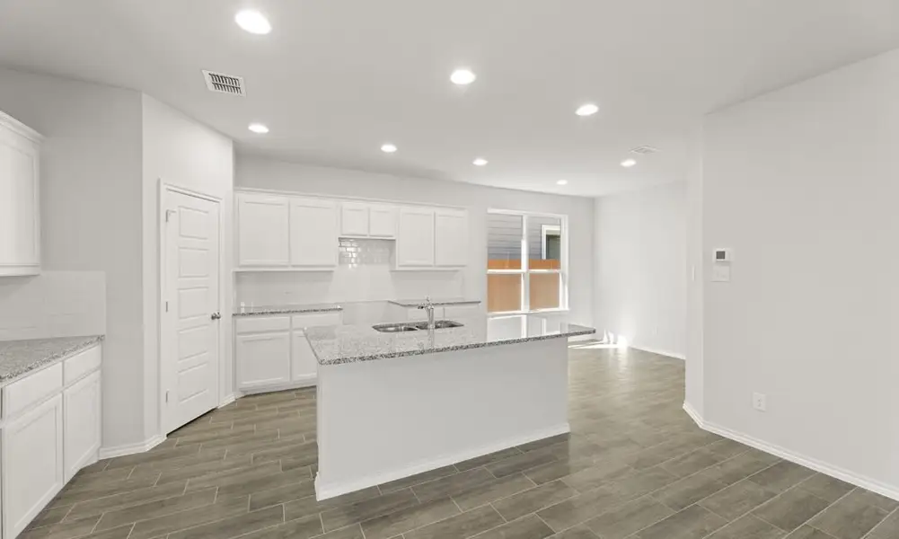 Representative exterior photo of a completed home built from the Thorndale by Impression Homes in Heartland, Heartland, TX (Image 7). Representative exterior photo of a completed home built from the Thorndale by Impression Homes in Heartland, Heartland, TX (Image 7).