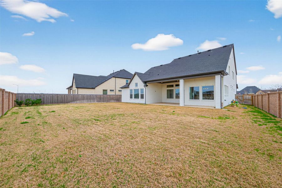 Exterior details and patio area of a home in Dunham Pointe 65' Homesites, Cypress (Image 3). Exterior details and patio area of a home in Dunham Pointe 65' Homesites, Cypress (Image 3).