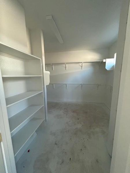 Walk-in Closet in Primary Bedroom Walk-in Closet in Primary Bedroom