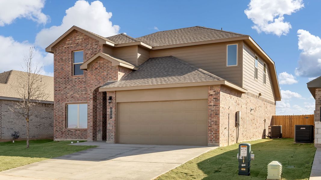 Front exterior of a new home in Overlook West, Wolfforth, TX, highlighting curb appeal (Image 2).
