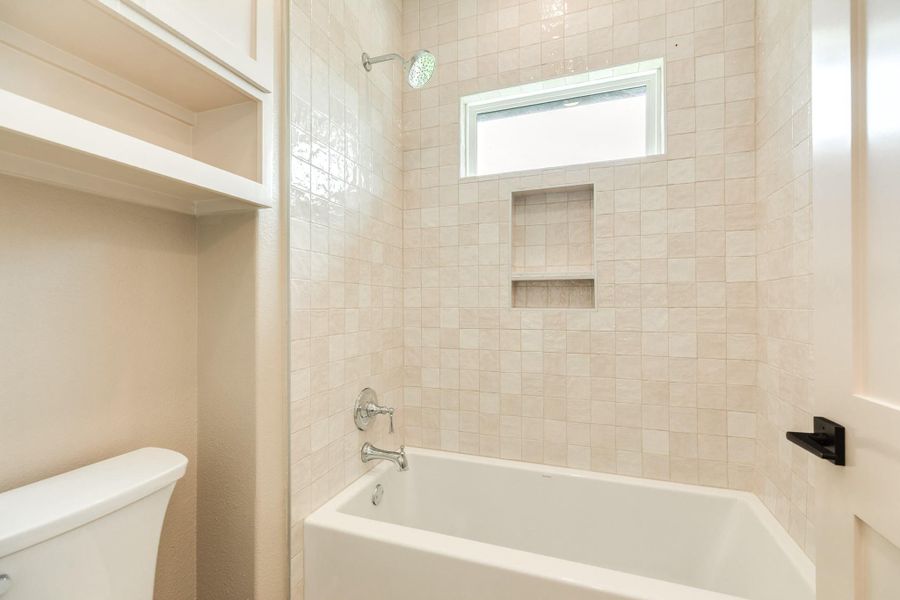 This timeless tile elevates the look of this space.  All colors were desinged and thoughtfully curated by an interior designer.