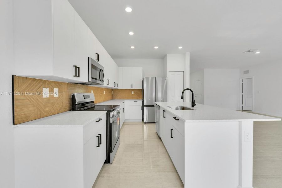 Furnished interior view inside a new home in , Miami (Image 16). Furnished interior view inside a new home in , Miami (Image 16).