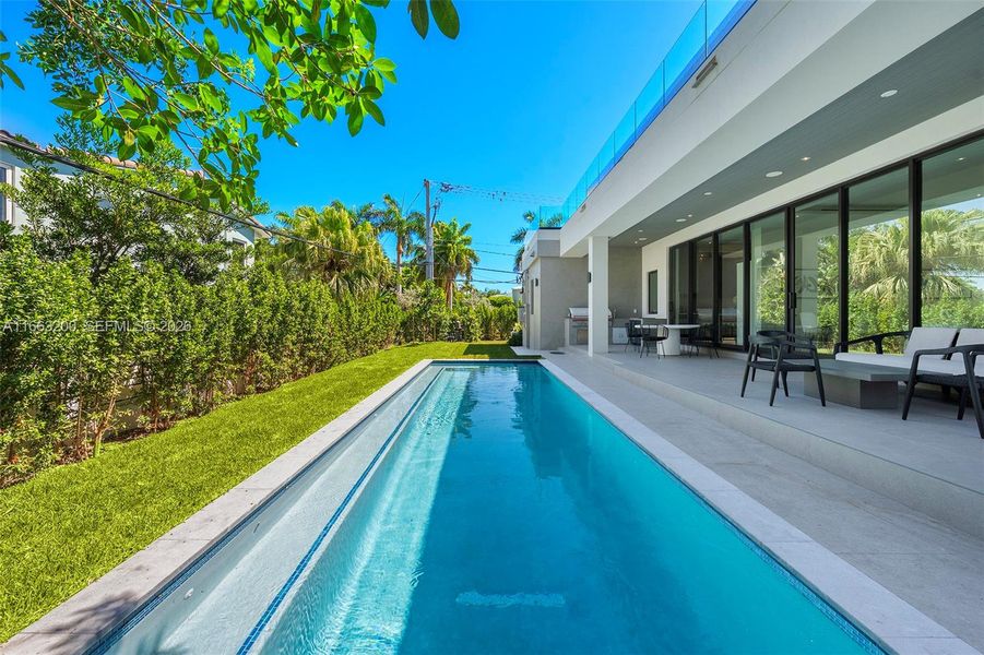 Exterior details and patio area of a home in , Miami Beach (Image 38). Exterior details and patio area of a home in , Miami Beach (Image 38).