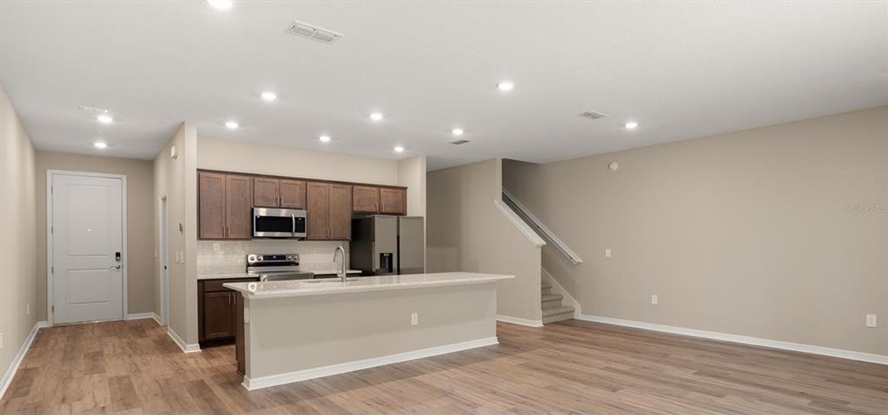 Furnished interior view inside a new home in , St. Cloud (Image 8).