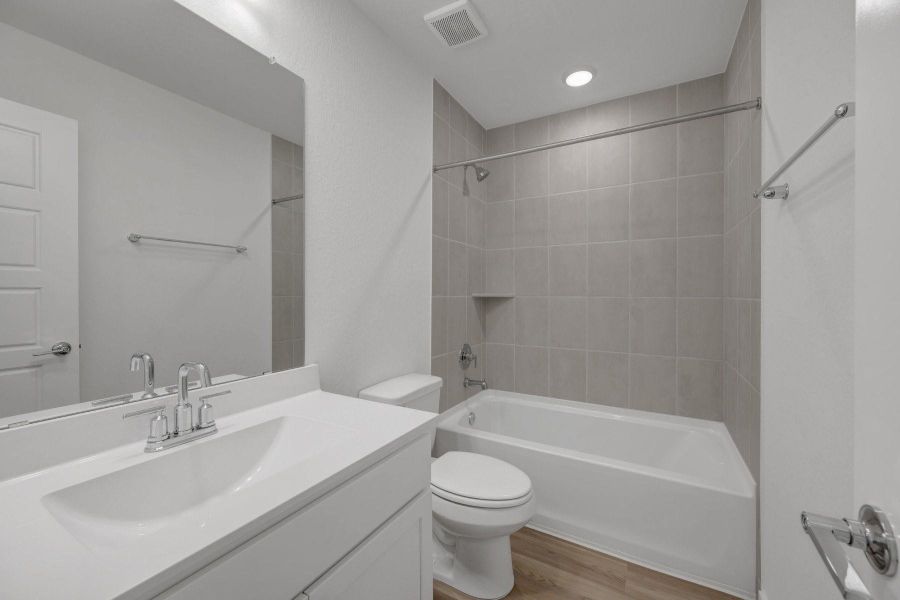 Furnished interior view inside a new home in Pinewood at Grand Texas, New Caney (Image 12).
