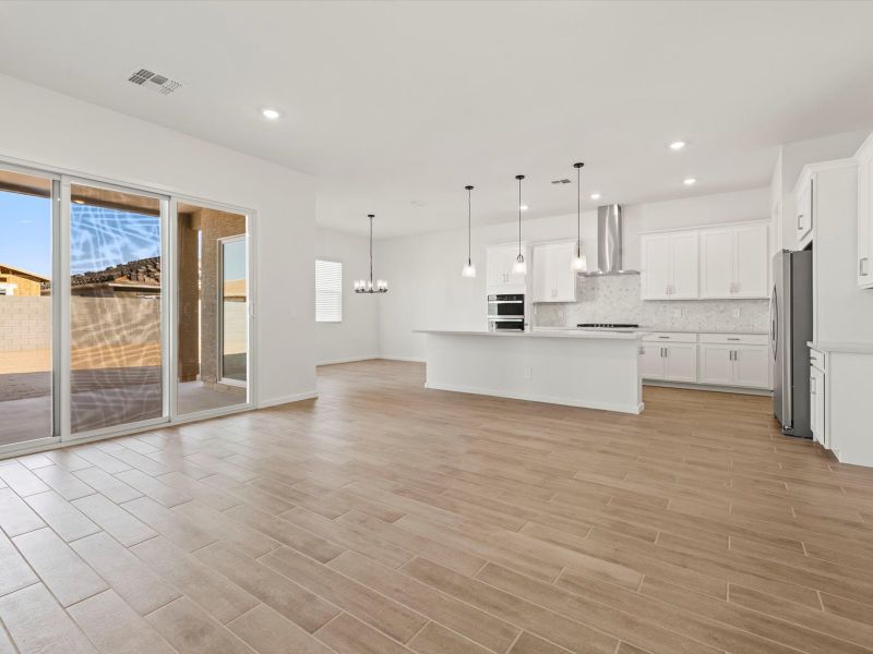 Spacious, unfurnished interior of a new home in White Tank Foothills Signature Series, Waddell (Image 8).