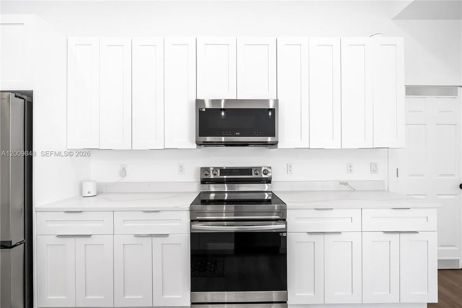 Furnished interior view inside a new home in , Clewiston (Image 17).
