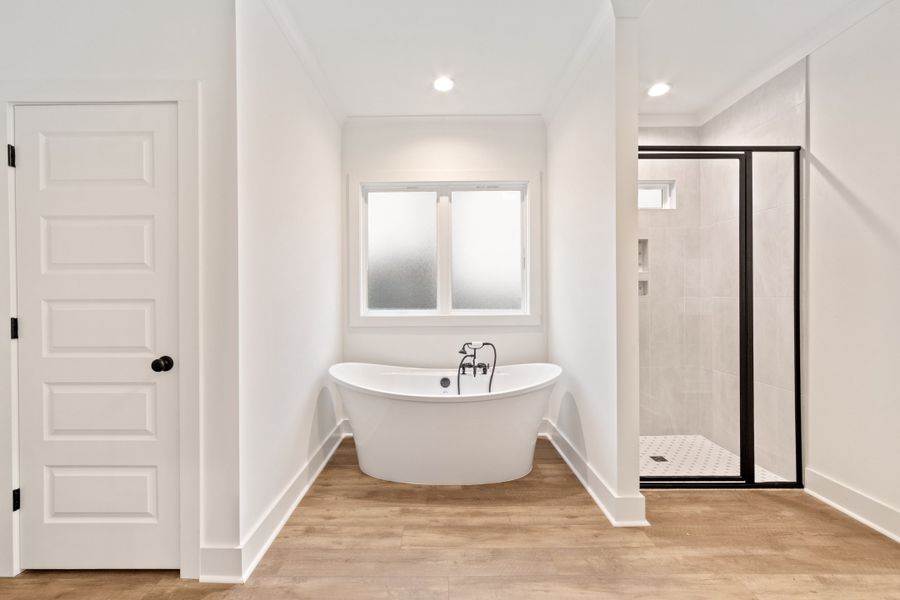 Representative furnished interior of a home built from the The Charlotte by Manuel Builders in Chapel Bend, Montgomery (Image 13).