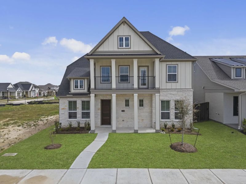 Representative exterior photo of a completed home built from the Sorenstam by Chesmar Homes in Riceland Alley Loads, Mont Belvieu, TX (Image 26).