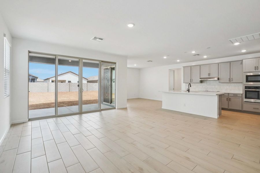 Great room, kitchen and dining