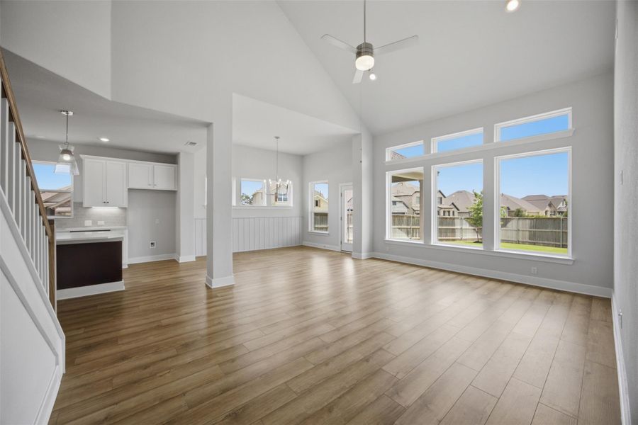 Natural light floods this spacious gathering area with soaring vaulted ceilings.