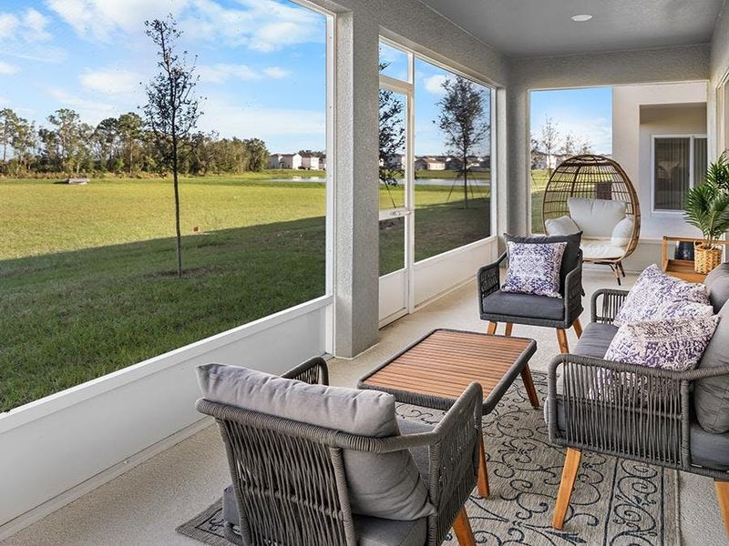 Your interior opens to outdoor living space on an oversized lanai - Wesley II by Highland Homes Your interior opens to outdoor living space on an oversized lanai - Wesley II by Highland Homes