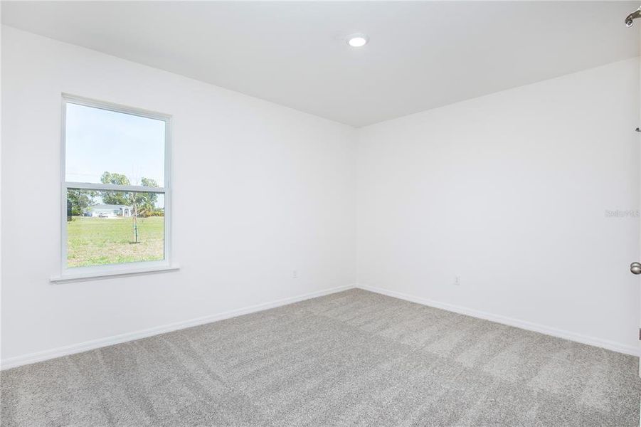 Spacious, unfurnished interior of a new home in Burnt Store Village, Punta Gorda (Image 15).